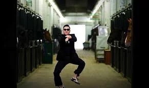 PSY performs the horse riding dance