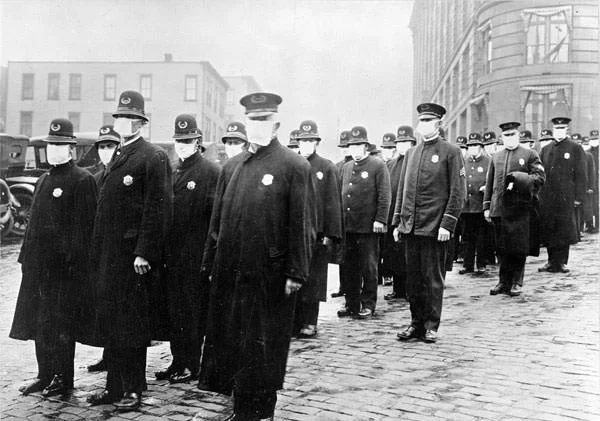Policemen wearing masks provided by the American Red Cross in Seattle, 1918