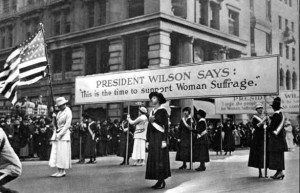 Women suffragists march