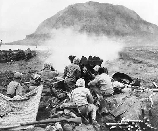 A U.S. 37 mm gun firing during the Battle of Iwo Jima