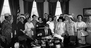 John F. Kennedy signs the Equal Pay Act into law