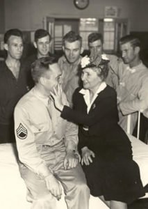 Helen Keller at an army hospital during WWII