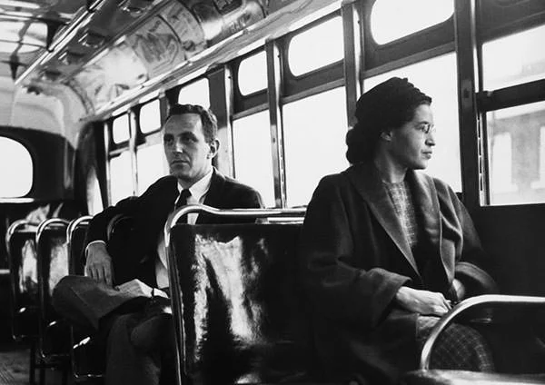 Rosa Parks in a bus after the Montgomery bus boycott