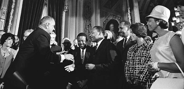 President Johnson at the signing of the 1965 Voting Rights Act