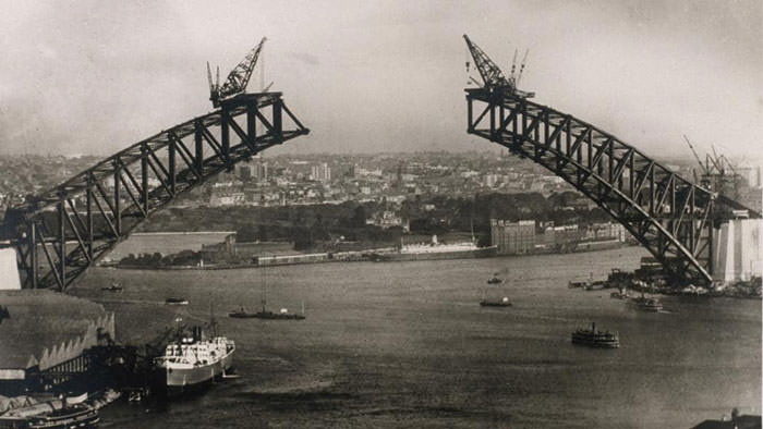 The Sydney Harbour Bridge under construction