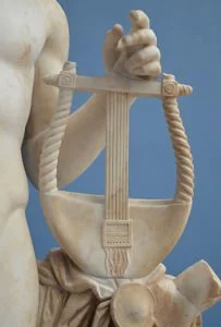 Apollo holding the lyre