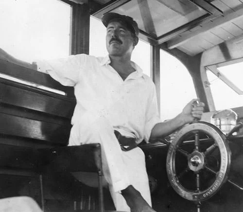 Hemingway on his boat Pilar